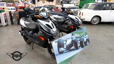 Lot 95 - 2x EX McLAREN PADDOCK SCOOTERS & SIGN
