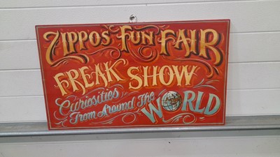 Lot 137 - ZIPPO FUN FAIR FREAK SHOW PAINTED ON WOOD