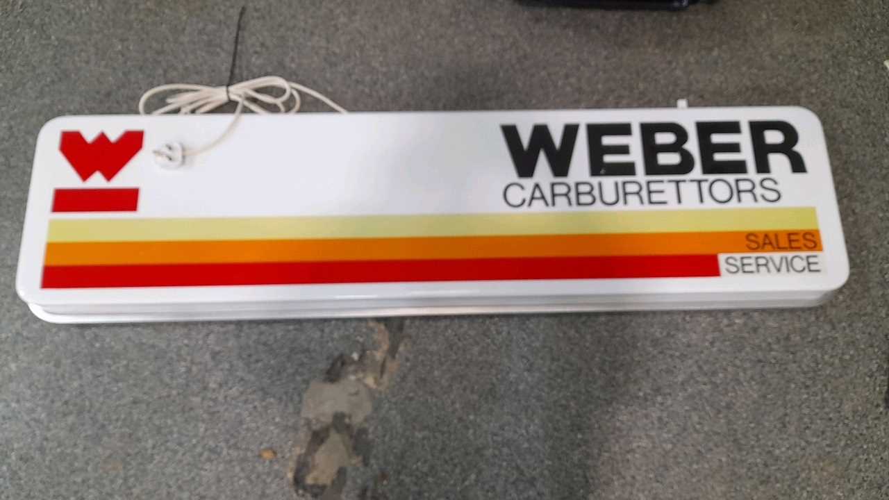 Lot 68 - WEBER CARBURETTORS SALES & SERVICE LIGHT-UP SIGN  61" X 16"