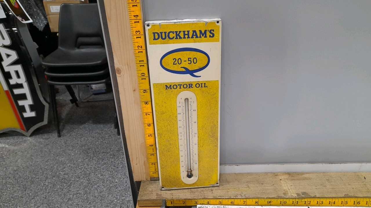 Lot 90 - DUCKHAMS MOTOR OIL THERMOMETER  14" X 5"