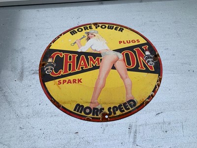 Lot 165 - CHAMPION SPARK PLUGS , MORE SPEED ENAMEL SIGN  12" DIA