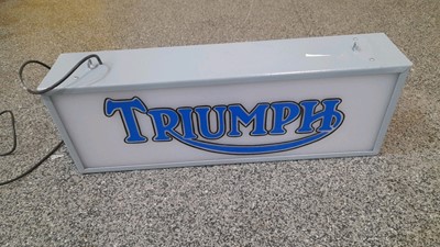 Lot 100 - TRIUMPH  DOUBLE SIDED LIGHT-UP SIGN  25" X 9"