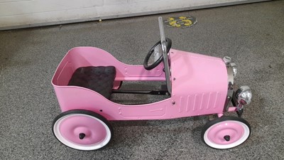 Lot 439 - PINK VINTAGE PEDAL CAR  ( EX SHOP DISPLAY AS NEW )