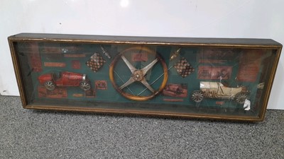 Lot 176 - HISTORY OF CAR RACING MEM IN GLASS CABINET
