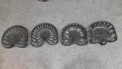 Lot 274 - SET OF 4 CAST IRON TRACTOR SEATS
