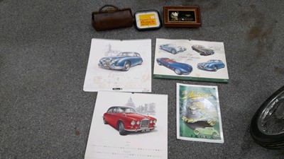 Lot 485 - BOSCH + E TYPE JAGUAR CLOCKS, CALENDARS + 1910 JUCO LEATHER BAG