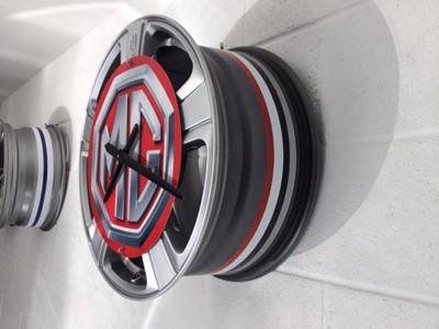 Lot 137 - MG ALLOY WHEEL CLOCK