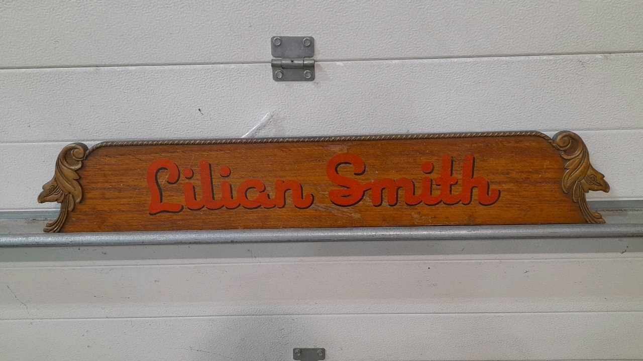 Lot 319 - LILLIAN SMITH WOODEN SIGN 36" X 6"