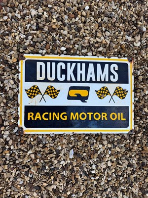 Lot 447 - DUCKHAMS RACING MOTOR OIL ENAMEL SIGN 15" X 10"