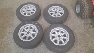 Lot 209 - 4 X MINILITE ALLOY WHEELS & TYRES 5.5 J 14 MGB- STAG