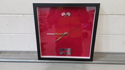 Lot 809 - TRIUMPH RED WALL CLOCK 13" X 13"