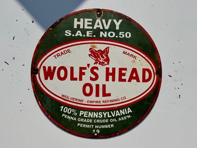 Lot 87 - WOLF'S HEAD OIL ENAMEL SIGN 12" DIA