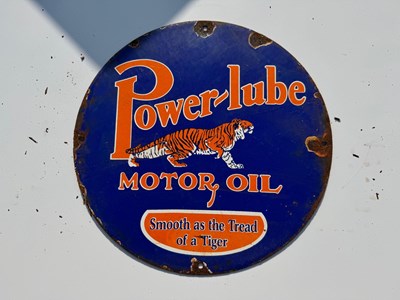 Lot 93 - POWER-LUBE MOTOR OIL ENAMEL SIGN 12" DIA