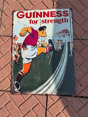 Lot 893 - GUINNESS FOR STRENGTH FOOTBALLER SIGN 27.5" X 20"