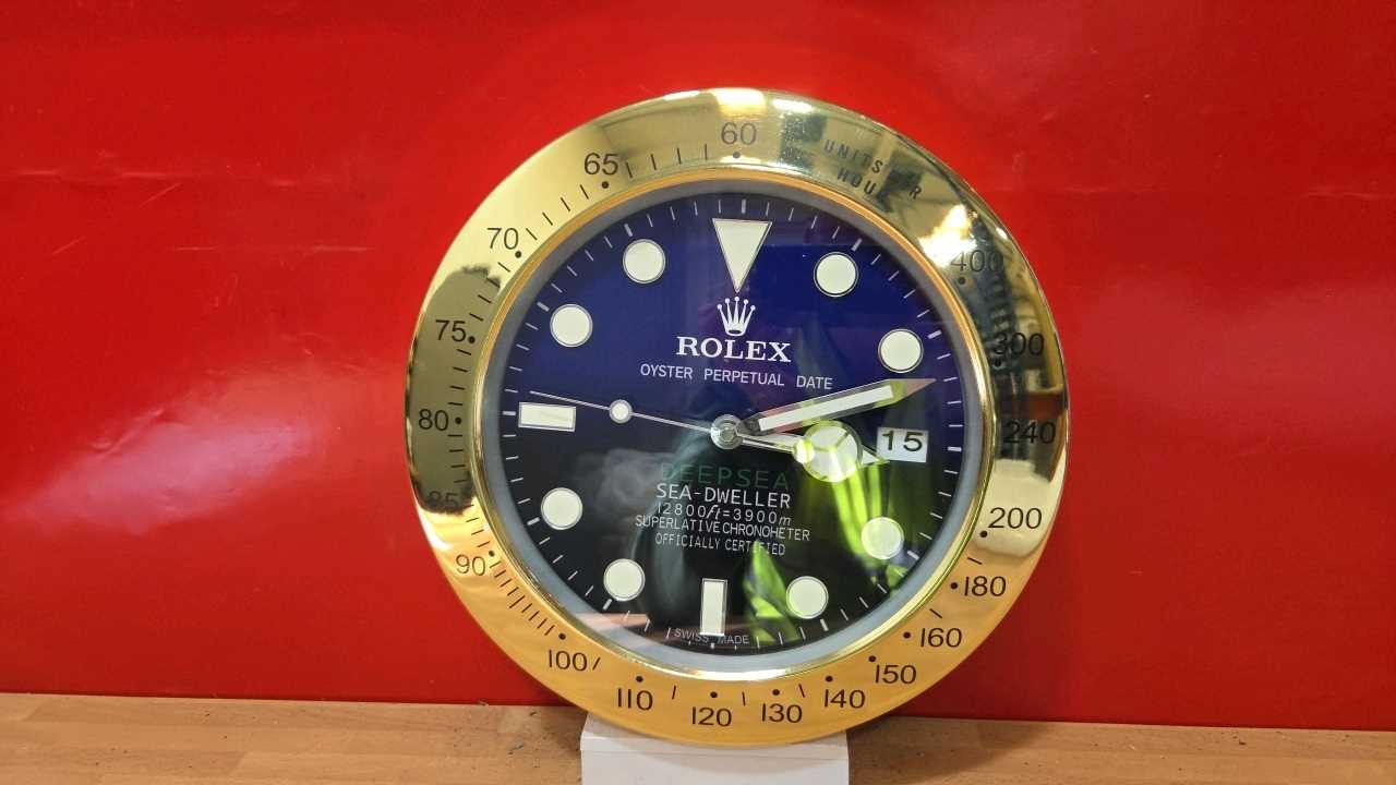 Lot 101 - ROLEX STYLE WALL CLOCK 13" DIA