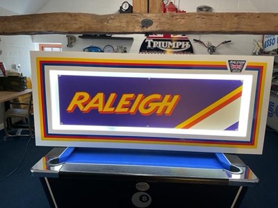 Lot 33 - LARGE ILLUMINATED RALEIGH SIGN 57" X 24"