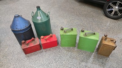 Lot 555 - PETROL / OIL CANS