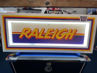 Lot 307 - LARGE ILLUMINATED RALEIGH SIGN 57" X 24"