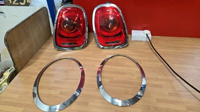 Lot 885 - MINI ONE REAR LIGHTS / FRONT AND REAR SURROUNDS