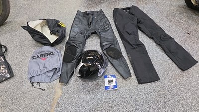 Lot 857 - NEW UN USED FULL FACE HELMET & 2 PAIRS OF MOTOR BIKE TROUSERS