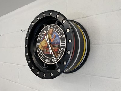Lot 668 - PIN UP GIRL ALLOY WHEEL CLOCK
