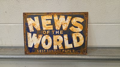 Lot 647 - NEWS OF THE WORLD ENAMEL SIGN 12" X 8"