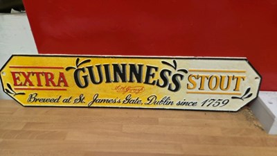 Lot 163 - SET OF 3 CAST IRON GUINNESS SIGNS