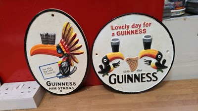 Lot 163 - SET OF 3 CAST IRON GUINNESS SIGNS