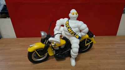 Lot 531 - MICHELIN MAN ON MOTOR BIKE 19" X 13"