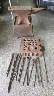 Lot 583 - BLACKSMITHS ANVIL , SWAGE BLOCK , STAND AND SELECTION OF TONGS