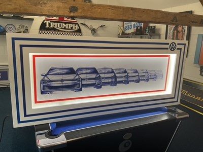 Lot 603 - LARGE ILLUMINATED VOLKSWAGEN EVOLUTION SIGN, 55 INCHES X 24 INCHES