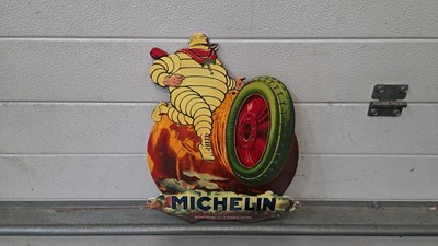 Lot 897 - MICHELIN MAN ON A TYRE ENAMEL SIGN 16" X 12"