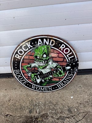 Lot 695 - ROCK AND ROLL SIGN 14" DIA