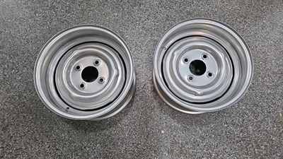 Lot 569 - PAIR OF NEW UNUSED FORD 6J 13" STEEL WHEEL RIMS