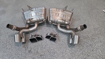 Lot 509 - PAIR OF PORSCHE 911 CARRERA 4 MODEL 997 EXHAUST SILENCERS VERY LOW MILEAGE USE