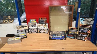 Lot 661 - COLLECTION OF JAMES BOND MODELS WITH WOODEN DISPLAY CASE AND GLASS SHELVES
