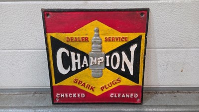 Lot 863 - CHAMPION SPARK PLUGS CAST SIGN 10" X 10"