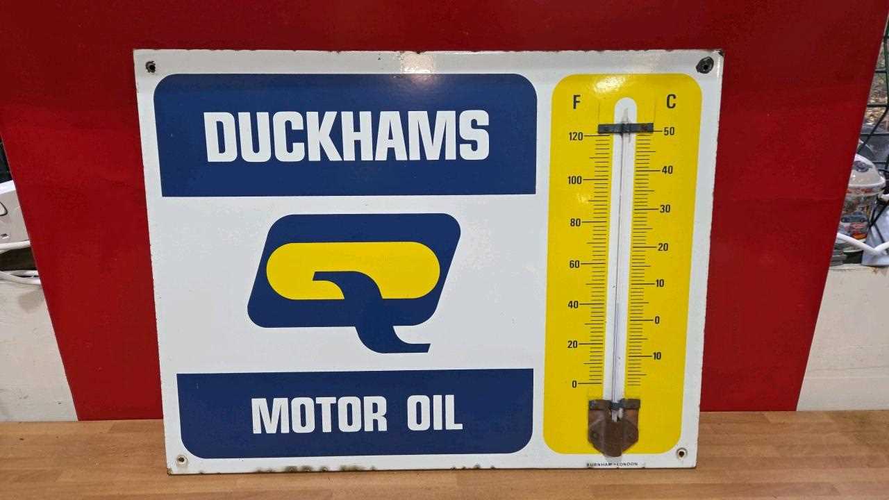 Lot 301 - DUCKHAMS MOTOR OIL ENAMEL THERMOMETER 26" X 20"