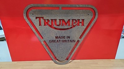 Lot 827 - METAL TRIUMPH MADE IN BRITAIN SIGN 21" x 23"