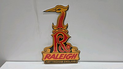 Lot 415 - PLASTIC RALEIGH SIGN 24" X 12"