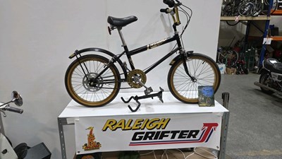 Lot 429 - RALEIGH GRIFTER BICYCLE, WALL MOUNTING BRACKET , BANNER & SIGN