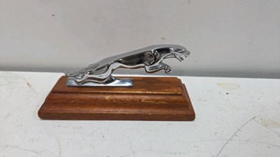 Lot 495 - JAGUAR MASCOT ON WOODEN PLINTH
