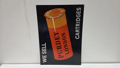 Lot 219 - TIN REPRO WE SELL PURDEY CARTRIDGES SIGN 28" X 20"