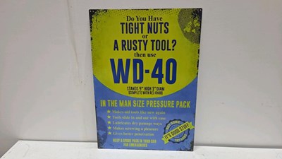 Lot 469 - TIN REPRO WD40 DO YOU HAVE TIGHT NUTS SIGN 28" X 20"