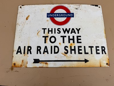 Lot 637 - THIS WAY TO THE AIR RAID SHELTER , ENAMEL REPRO SIGN 14" X 10"
