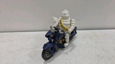 Lot 643 - CAST MICHELIN MAN ON MOTOR BIKE AND SIDECAR 9" X 6"