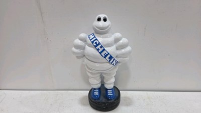 Lot 789 - MICHELIN MAN ON A TYRE 20" X 12"