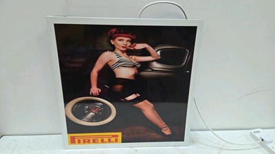 Lot 29 - PIRELLI GIRL LIGHT UP SIGN 24" x 24"