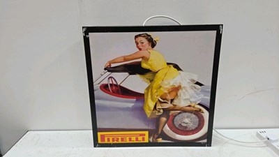 Lot 417 - PIRELLI GIRL LIGHT UP SIGN 24" x 24"
