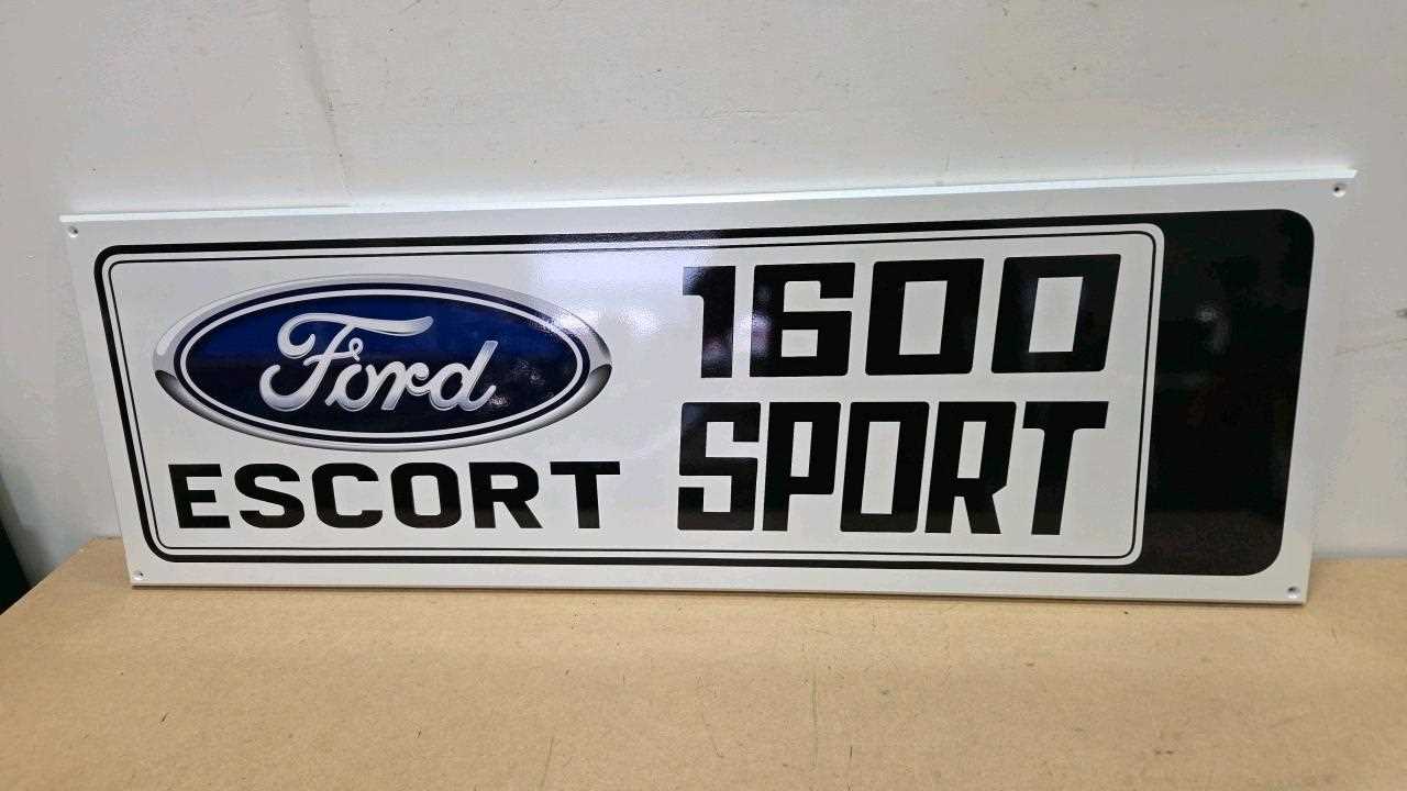 Lot 183 - WOODEN HAND MADE FORD ESCORT 1600 SPORT SIGN 48" X 16"